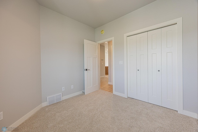 6598 68th St S, Horace, ND 58047 - unfurnished bedroom with carpet floors and a closet