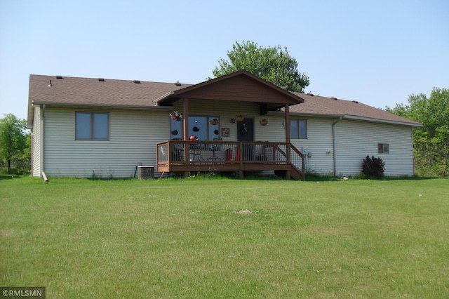 50355 Cedarcrest Ave, Rush City, MN 55069 - rear view of property featuring a yard, a wooden deck, and roof with shingles