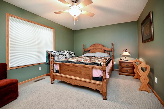 705 14th St, Wabasha, MN 55981 - bedroom with carpet floors, baseboards, and ceiling fan