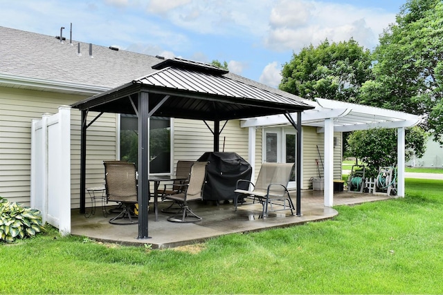705 14th St, Wabasha, MN 55981 - view of patio with grilling area and a pergola