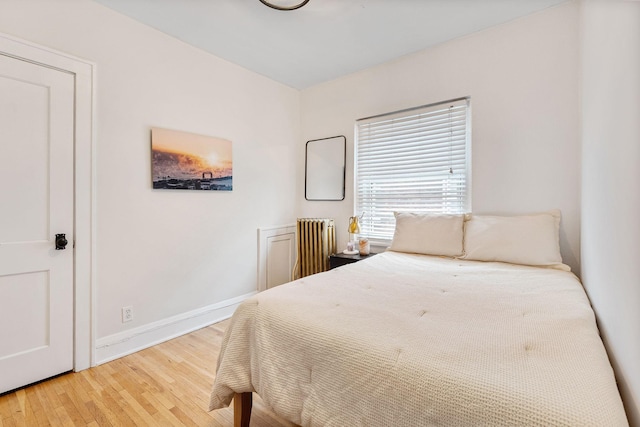 3409 Emerson Ave S Unit 4, Minneapolis, MN 55408 - bedroom featuring wood finished floors and baseboards