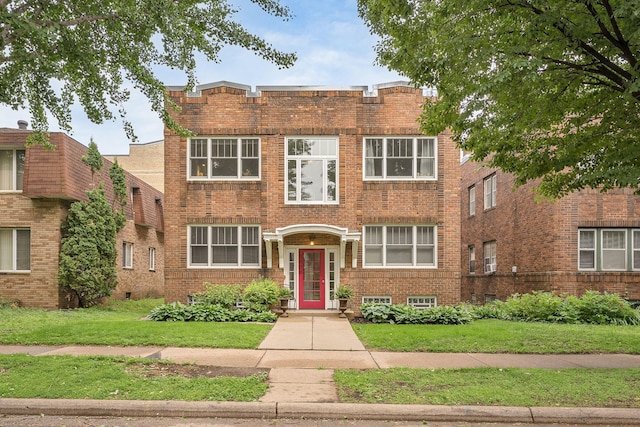 3409 Emerson Ave S Unit 4, Minneapolis, MN 55408 - view of front of property with brick siding and a front yard