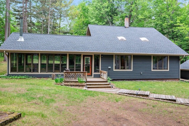 3709 Half Moon Cir, Jackson Twp, WI 54830 - view of front of home featuring a chimney, a shingled roof, a front yard, and a porch