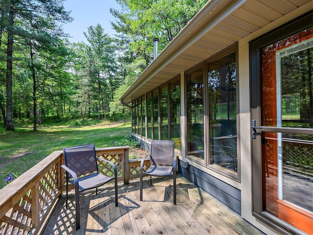 3709 Half Moon Cir, Jackson Twp, WI 54830 - wooden deck featuring a yard and a sunroom