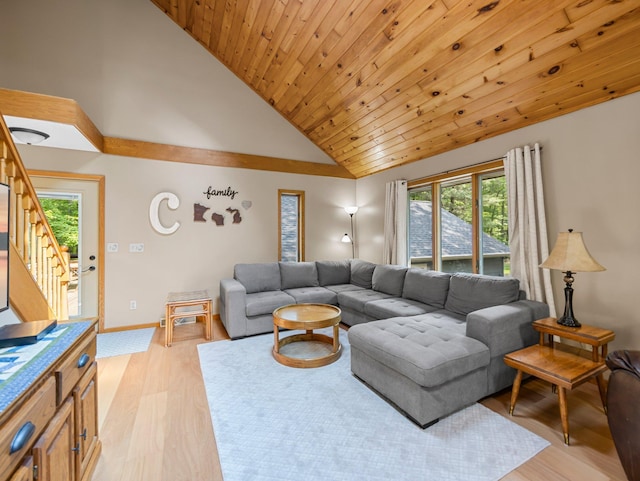 3709 Half Moon Cir, Jackson Twp, WI 54830 - living room with plenty of natural light, light wood-style floors, stairway, wood ceiling, and high vaulted ceiling