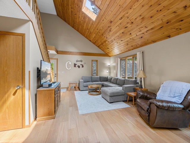 3709 Half Moon Cir, Jackson Twp, WI 54830 - living room with high vaulted ceiling, light wood finished floors, and a skylight