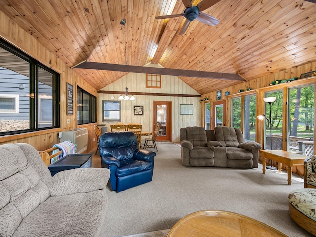 3709 Half Moon Cir, Jackson Twp, WI 54830 - living area featuring carpet flooring, wood walls, a chandelier, ceiling fan, and a wall mounted air conditioner
