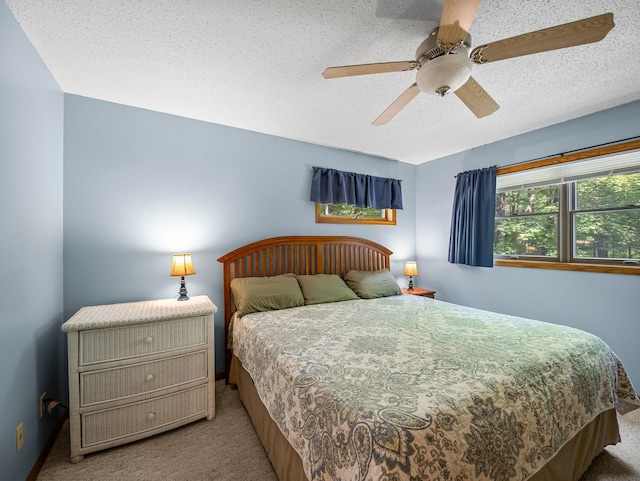 3709 Half Moon Cir, Jackson Twp, WI 54830 - carpeted bedroom with a textured ceiling and ceiling fan