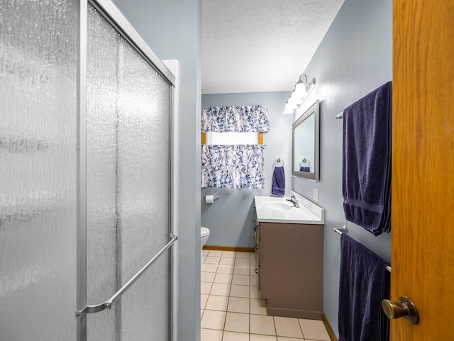 3709 Half Moon Cir, Jackson Twp, WI 54830 - bathroom featuring tile patterned flooring, vanity, a shower stall, and a textured ceiling
