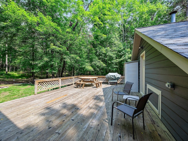 3709 Half Moon Cir, Jackson Twp, WI 54830 - deck featuring grilling area and a forest view