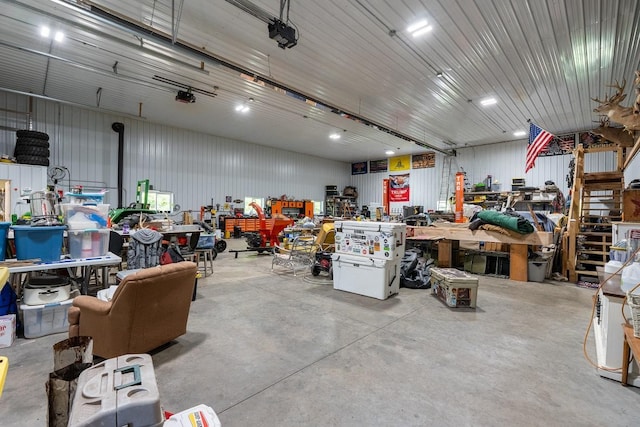 N1024 385th St, Maiden Rock, WI 54750 - garage with a workshop area and a garage door opener