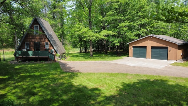 76683 Long Lake Rd, Kettle River Twp, MN 55795 - view of home's exterior with a lawn, a garage, a wooden deck, and an outdoor structure