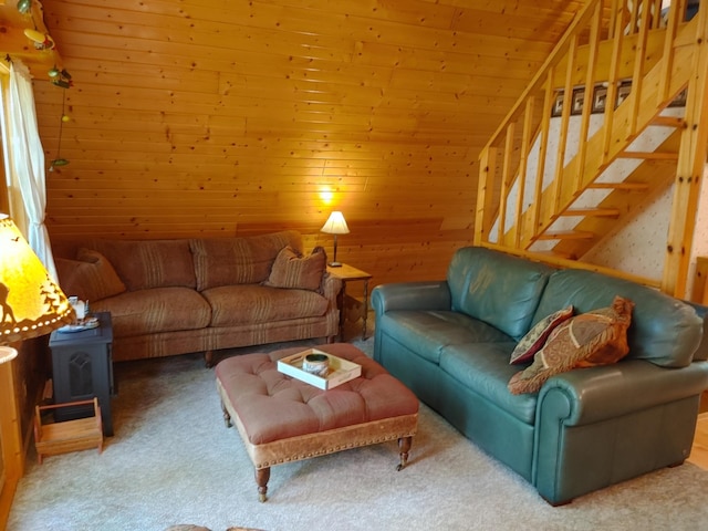 76683 Long Lake Rd, Kettle River Twp, MN 55795 - carpeted living room featuring wood walls and stairs