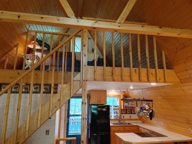 76683 Long Lake Rd, Kettle River Twp, MN 55795 - staircase featuring wood walls and wood ceiling