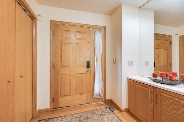 5 Anemone Cir, North Oaks, MN 55127 - entryway featuring light wood-type flooring and baseboards