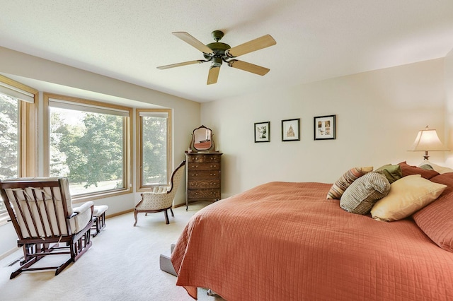 5 Anemone Cir, North Oaks, MN 55127 - bedroom with light carpet, ceiling fan, and baseboards
