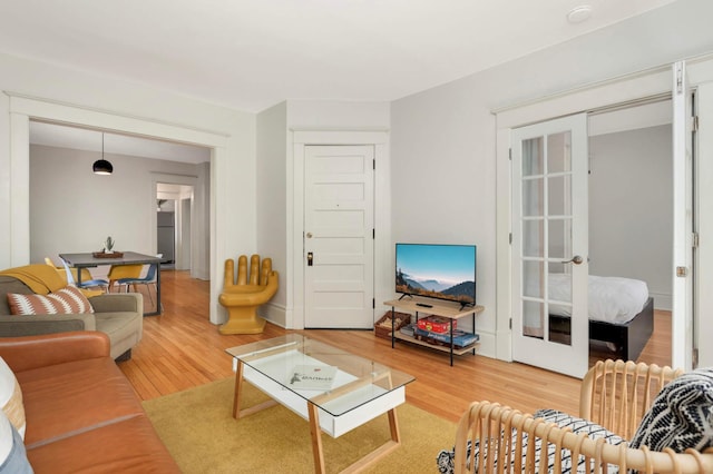 681 Dayton Ave, Saint Paul, MN 55104 - living room featuring light wood-style flooring and french doors