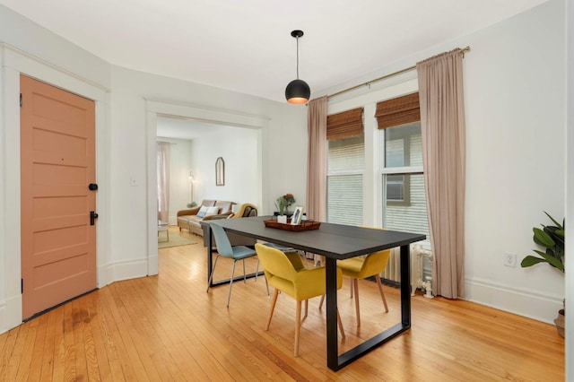 681 Dayton Ave, Saint Paul, MN 55104 - dining room featuring light wood-style flooring and baseboards