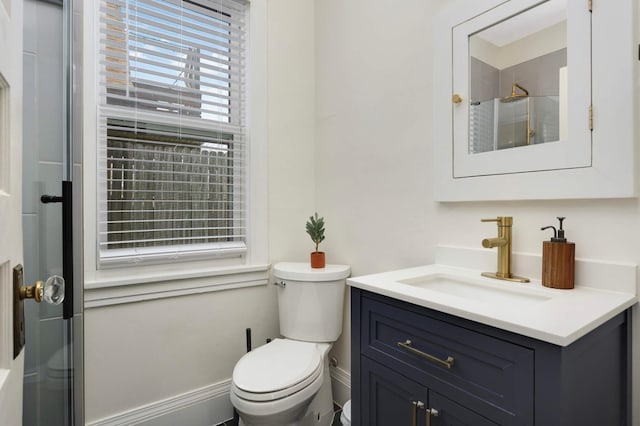 681 Dayton Ave, Saint Paul, MN 55104 - bathroom with vanity, toilet, and a shower with door