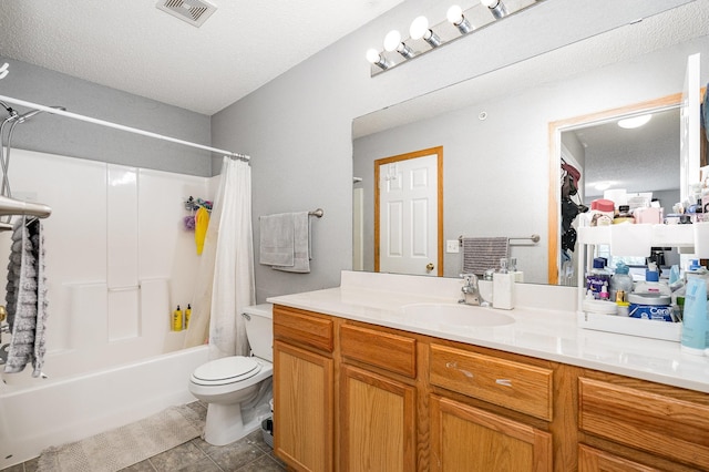 13525 Partridge Cir NW, Andover, MN 55304 - full bath featuring vanity, shower / tub combo, toilet, tile patterned floors, and a textured ceiling