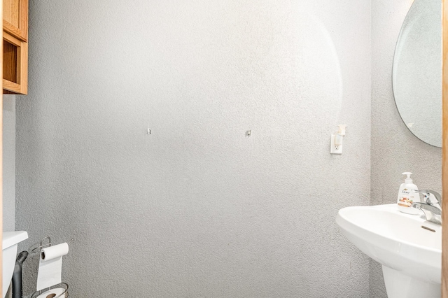 13525 Partridge Cir NW, Andover, MN 55304 - bathroom featuring toilet and a sink