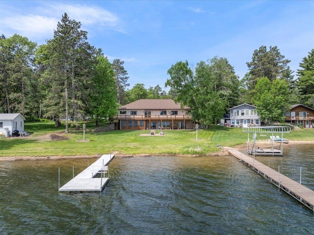 9174 Aloha Ln, Pelican Twp, MN 56472 - dock area with a water view and a lawn
