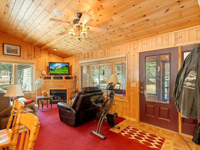 9174 Aloha Ln, Pelican Twp, MN 56472 - living room with lofted ceiling, healthy amount of natural light, wooden walls, wooden ceiling, and ceiling fan