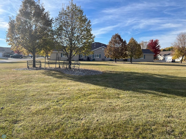 358 30th St N, Moorhead, MN 56560 - view of green lawn featuring a residential view
