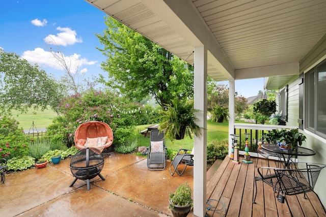 2146 84th Ave, Osceola, WI 54020 - porch with a fire pit and a patio