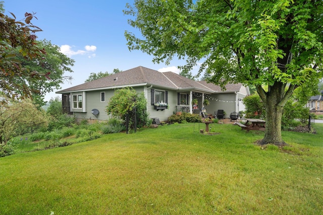 2146 84th Ave, Osceola, WI 54020 - view of front of property with a front yard, a garage, and a shingled roof