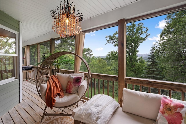 2146 84th Ave, Osceola, WI 54020 - sunroom featuring a chandelier