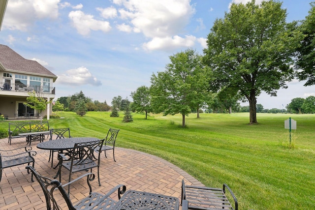 749 Fairway Dr, Medina, MN 55340 - view of patio / terrace with outdoor dining space and a balcony