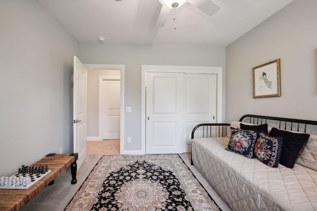 749 Fairway Dr, Medina, MN 55340 - bedroom featuring light colored carpet, a closet, and a ceiling fan