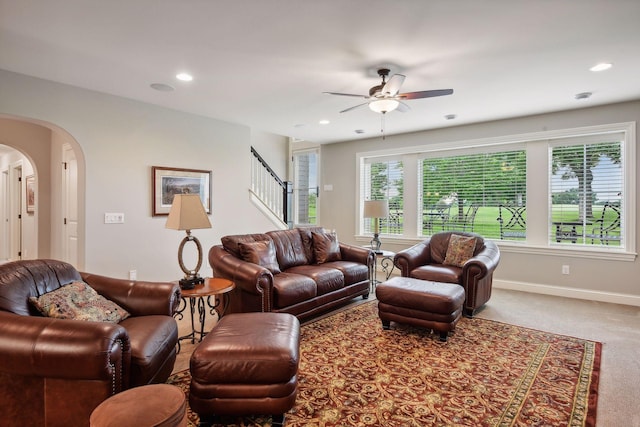 749 Fairway Dr, Medina, MN 55340 - living area with stairway, arched walkways, a ceiling fan, carpet floors, and recessed lighting