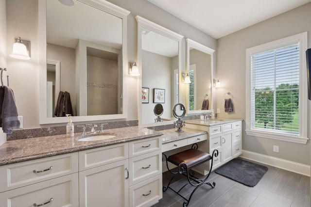 749 Fairway Dr, Medina, MN 55340 - bathroom featuring vanity and baseboards