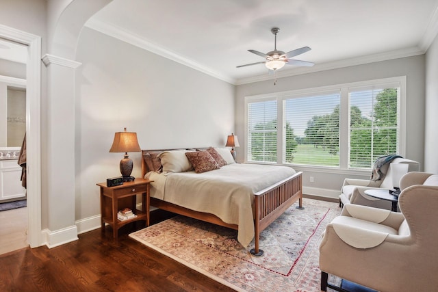 749 Fairway Dr, Medina, MN 55340 - bedroom with baseboards, wood finished floors, crown molding, decorative columns, and arched walkways