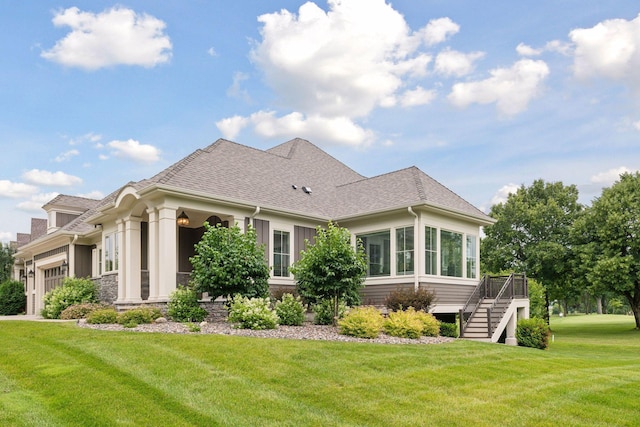 749 Fairway Dr, Medina, MN 55340 - rear view of house with a lawn, stairway, a deck, and a shingled roof