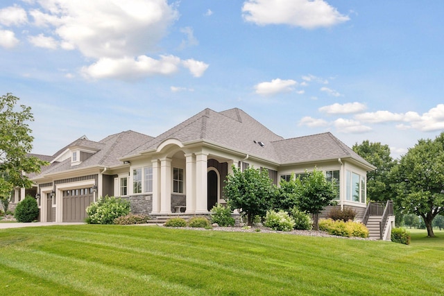 749 Fairway Dr, Medina, MN 55340 - french country style house with a front lawn, an attached garage, stone siding, a shingled roof, and driveway