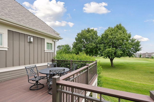 749 Fairway Dr, Medina, MN 55340 - deck with outdoor dining area and a yard