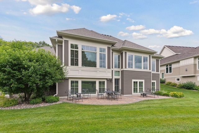 749 Fairway Dr, Medina, MN 55340 - rear view of house with a lawn and a patio
