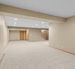 14457 Freesia Way, Apple Valley, MN 55124 - finished below grade area with recessed lighting, light carpet, and baseboards