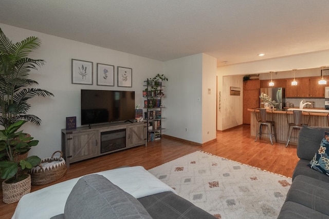 1269 Cleveland Ave N Unit 2B, Saint Paul, MN 55108 - living area with light wood-type flooring, recessed lighting, and baseboards