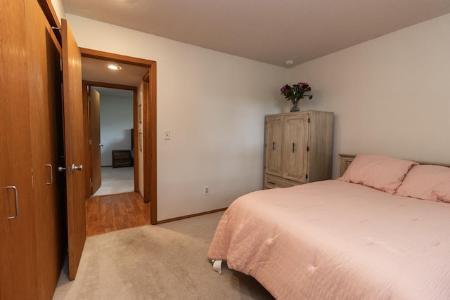 1269 Cleveland Ave N Unit 2B, Saint Paul, MN 55108 - bedroom with light carpet and baseboards