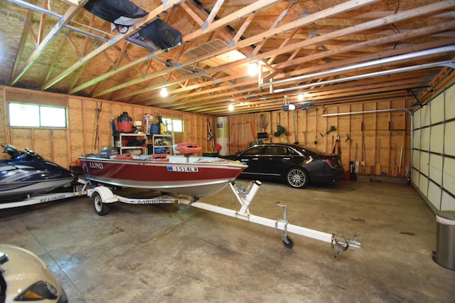 27625 Clear Sky Rd, Jackson Twp, WI 54893 - garage featuring a garage door opener