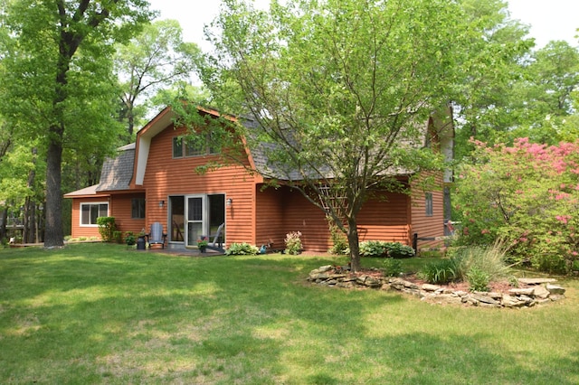 27625 Clear Sky Rd, Jackson Twp, WI 54893 - back of house featuring a gambrel roof, a yard, and a shingled roof