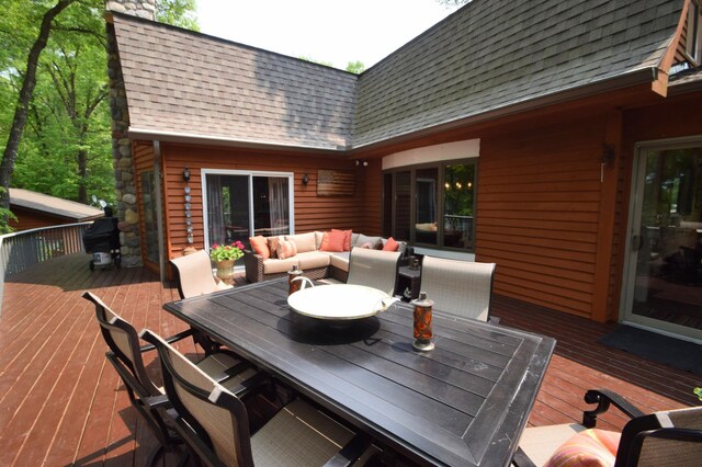 27625 Clear Sky Rd, Jackson Twp, WI 54893 - deck featuring outdoor dining area and an outdoor hangout area