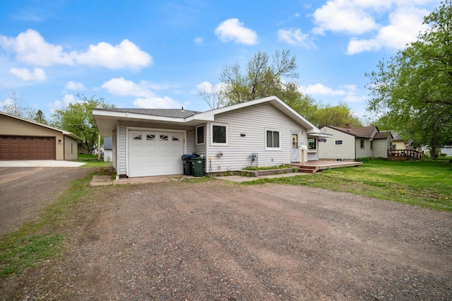 1609 Doddridge Ave, Cloquet, MN 55720 - single story home featuring a deck, driveway, and a garage
