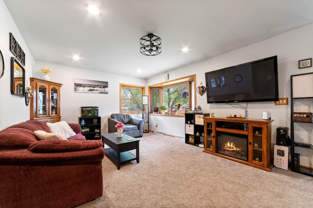 1609 Doddridge Ave, Cloquet, MN 55720 - carpeted living area with recessed lighting and a glass covered fireplace