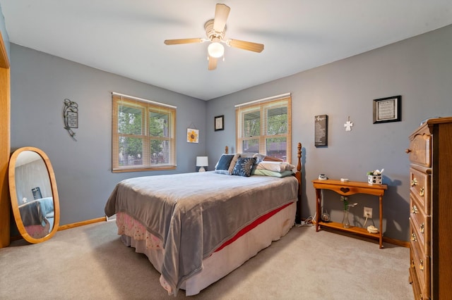 1609 Doddridge Ave, Cloquet, MN 55720 - bedroom with multiple windows, light carpet, and baseboards