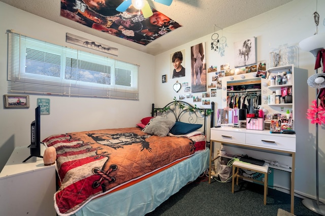 1609 Doddridge Ave, Cloquet, MN 55720 - carpeted bedroom with a textured ceiling and ceiling fan
